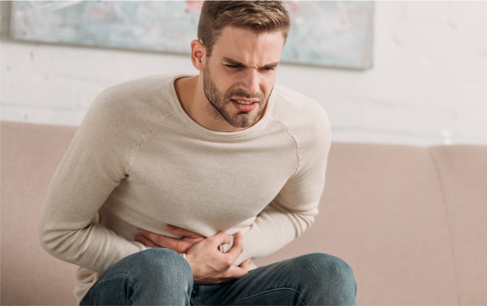 Man suffering from abdominal pain