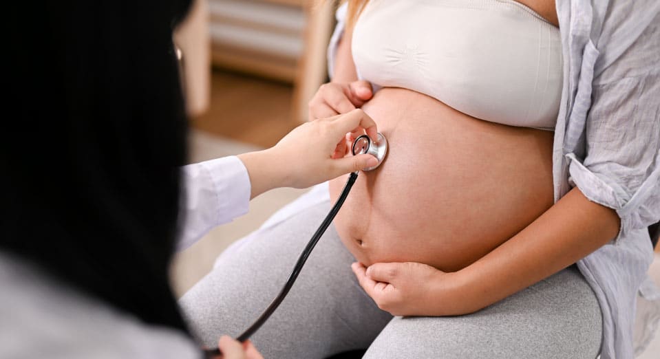 Physical examination on a pregnant woman